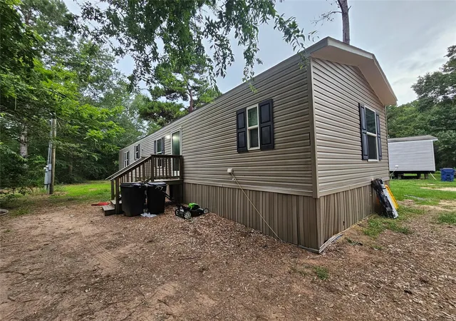 Photo 1 of Land for sale at 10299 Cox Ln, Plantersville, TX 77363 | MLS# 35530374 | Listing updated on 2026-06-06