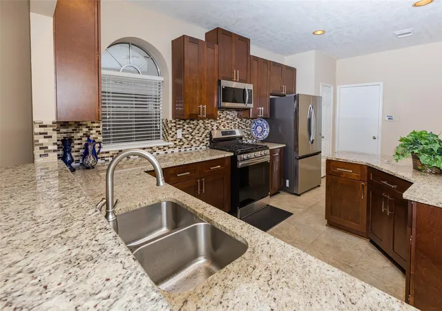Photo 4 of Single family home for sale at 14602 Liscomb Dr, Houston, TX 77084 | MLS# 11436178 | Listing updated on 2026-09-12