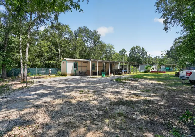 Photo 1 of Single family home for sale at 20 Juanita Ln, Shepherd, TX 77371 | MLS# 11052301 | Listing updated on 2026-07-25