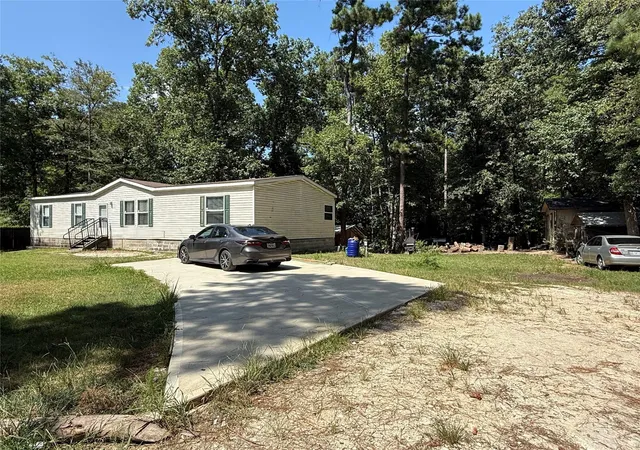 1st image of 285 County Road 2221, Cleveland, TX 77327 | MLS# 47161669