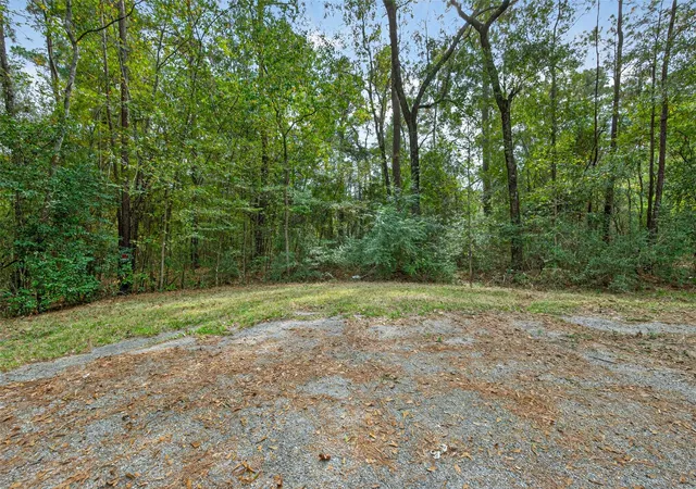 Photo 1 of Land for sale at Lot 410 411 N Woods, Cleveland, TX 77328 | MLS# 23801493 | Listing updated on 2026-05-27