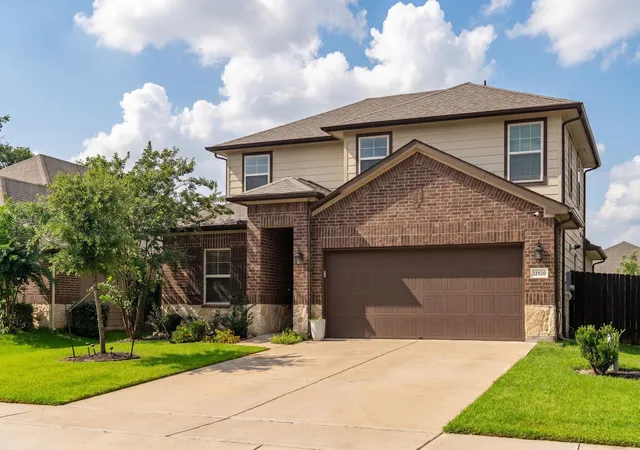Photo 2 of Single family home for sale at 12820 S Winding Pines Dr, Tomball, TX 77375 | MLS# 93799914 | Listing updated on 2026-10-03