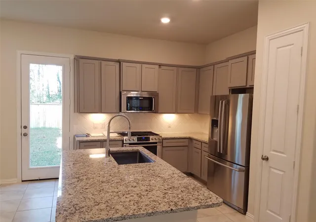 Photo 3 of Townhouse for sale at 218 Moon Dance Ct, Conroe, TX 77304 | MLS# 55231203 | Listing updated on 2026-08-29