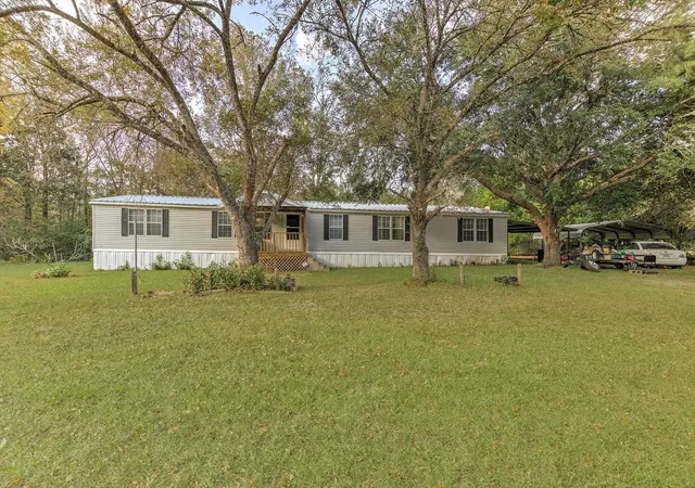 1st image of 102 County Road 2194 Road W, Cleveland, TX 77327 | MLS# 77813101