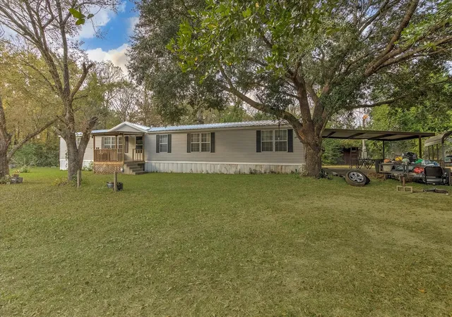 2nd image of 102 County Road 2194 Road W, Cleveland, TX 77327 | MLS# 77813101