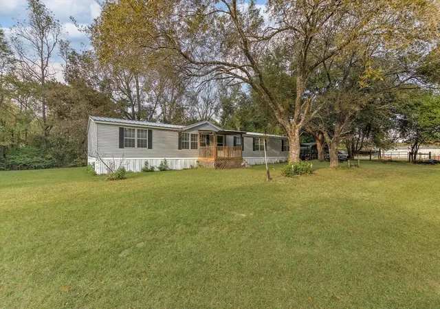 3rd image of 102 County Road 2194 Road W, Cleveland, TX 77327 | MLS# 77813101