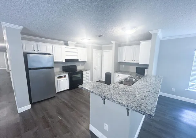 Photo 3 of Single family home for sale at 113 Varsity Dr, Huntsville, TX 77340 | MLS# 7814951 | Listing updated on 2026-07-20