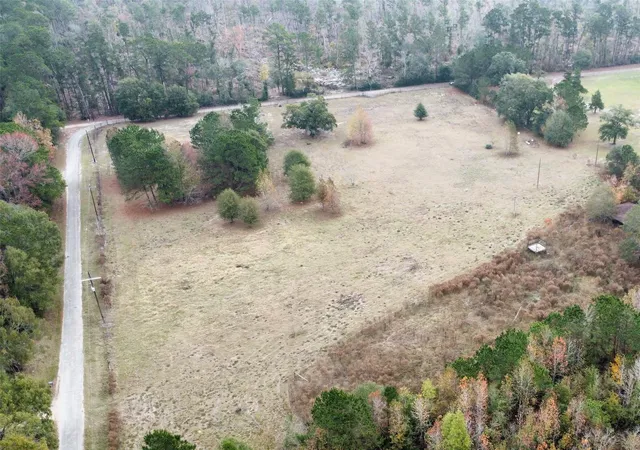 Photo 1 of Land for sale at 709 County Rd 3880, Cleveland, TX 77328 | MLS# 96014285 | Listing updated on 2025-12-14