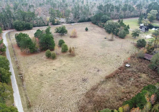 Photo 2 of Land for sale at 709 County Rd 3880, Cleveland, TX 77328 | MLS# 96014285 | Listing updated on 2025-12-14