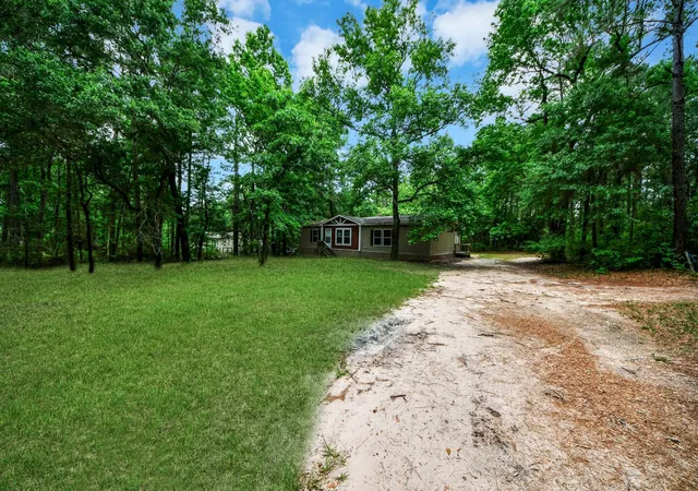 Photo 2 of Sale Pending at 24698 Country Oaks Blvd, Montgomery, TX 77316 | MLS# 1031626 | Listing updated on 2026-08-11