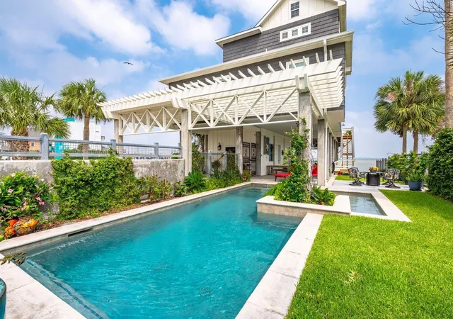 Photo 1 of Single family home for sale at 12 Tiki Cir, Galveston, TX 77554 | MLS# 93630354 | Listing updated on 2026-07-02