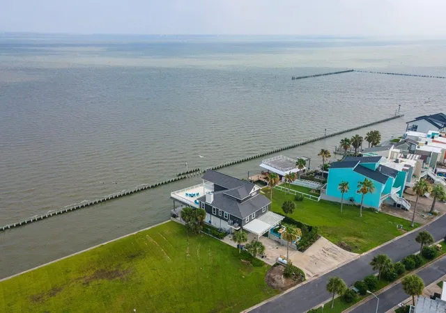 Photo 2 of Single family home for sale at 12 Tiki Cir, Galveston, TX 77554 | MLS# 93630354 | Listing updated on 2026-07-02