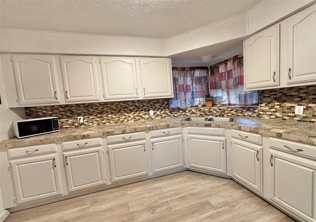 5th image of 8038 Woodlyn Rd, Houston, TX 77028 | MLS# 91631750
