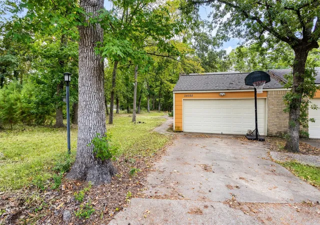 Photo 42 of Townhouse for sale at 24648 Pools Creek Dr, Huntsville, TX 77320 | MLS# 98050483 | Listing updated on 2026-09-01