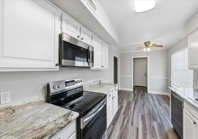 4th image of 5945 Townhouse Ln, Beaumont, TX 77707 | MLS# 74685744