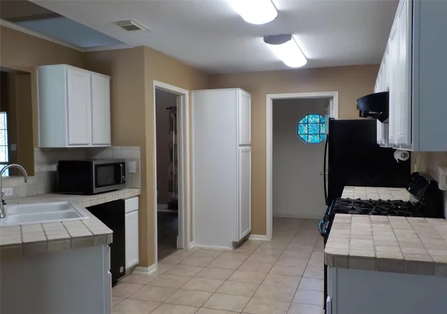 Photo 3 of Single family home for sale at 7973 S Fork Dr, Conroe, TX 77303 | MLS# 48549267 | Listing updated on 2026-09-11