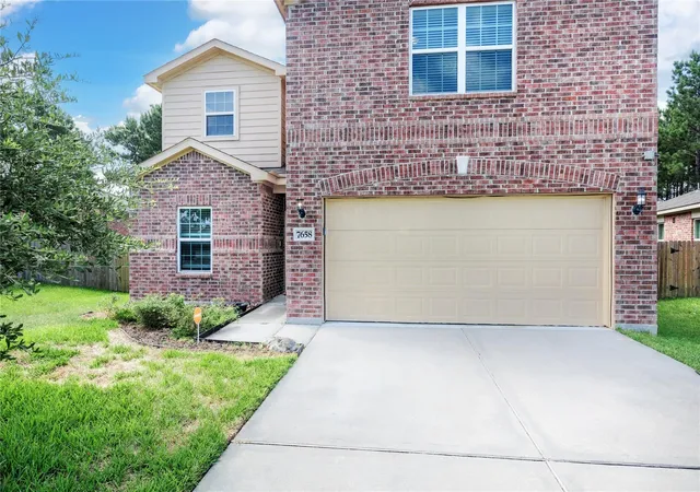 Photo 2 of Single family home for sale at 7658 Dragon Pearls Ln, Conroe, TX 77304 | MLS# 97942991 | Listing updated on 2026-09-06