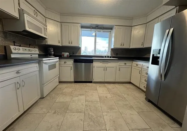 Photo 3 of Single family home for sale at 7109 N Monroe St, Spokane, WA 99208 | MLS# 202621489 | Listing updated on 2026-07-31