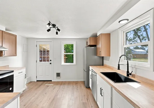 Photo 4 of Single family home for sale at 303 E Queen Ave, Spokane, WA 99207 | MLS# 202623350 | Listing updated on 2026-10-06