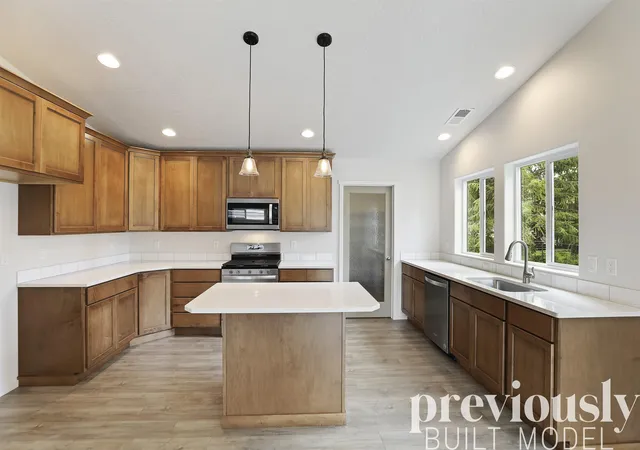 Photo 3 of Single family home for sale at 705 S Manifold Ln, Spokane Valley, WA 99016 | MLS# 202625329 | Listing updated on 2026-10-09