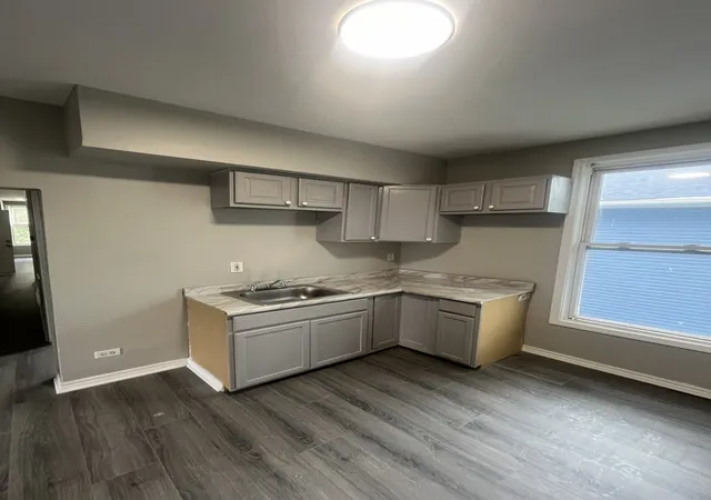 Photo 2 of Multi family home for sale at 33 E 100th Street, Chicago, IL 60628 | MLS# 12142345 | Listing updated on 2024-12-09
