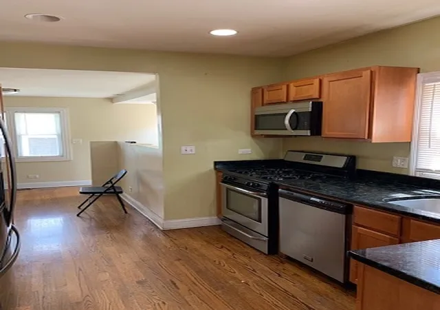 Photo 3 of Single family home for sale at 2011 S 12Th Ave, Maywood, IL 60153 | MLS# 12196495 | Listing updated on 2024-12-09