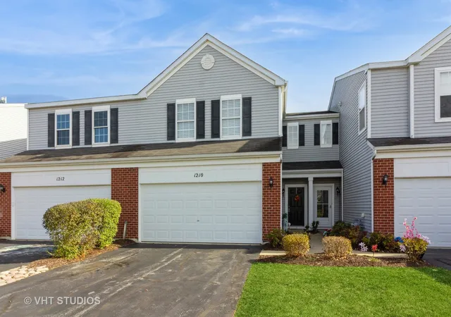 Photo 1 of Townhouse for sale at 1210 Courtland Cir, Plainfield, IL 60586 | MLS# 12203730 | Listing updated on 2024-12-08
