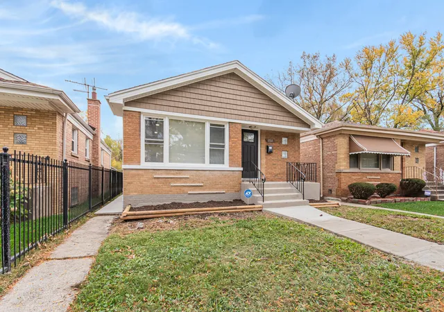 Photo 2 of Single family home for sale at 2211 W 81st Place, Chicago, IL 60620 | MLS# 12206333 | Listing updated on 2024-12-09
