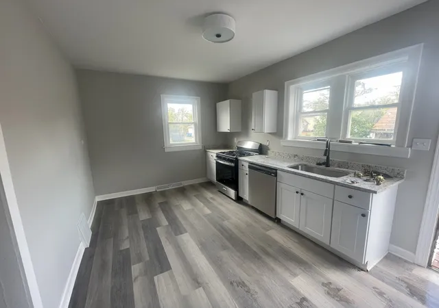 Photo 2 of Single family home for sale at 1 3 E 150th Street, Harvey, IL 60426 | MLS# 12213910 | Listing updated on 2024-12-07
