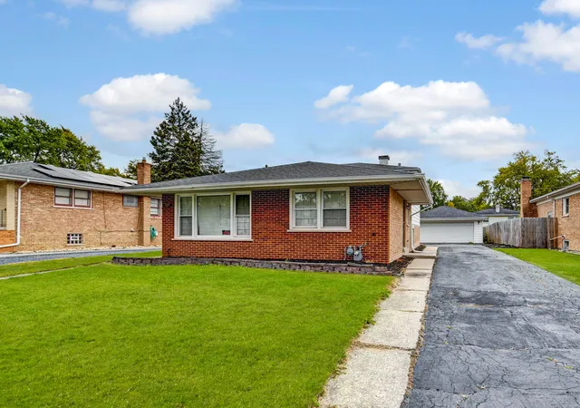 Photo 1 of Single family home for sale at 737 E 157th Place, South Holland, IL 60473 | MLS# 12216513 | Listing updated on 2024-12-10