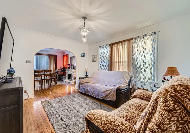 Photo 3 of Single family home for sale at 1422 S 20th Avenue, Maywood, IL 60153 | MLS# 12222311 | Listing updated on 2024-12-10