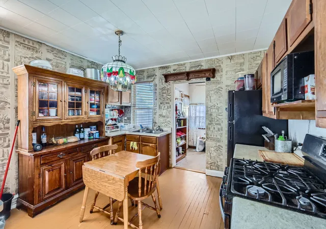 Photo 4 of Single family home for sale at 1422 S 20th Avenue, Maywood, IL 60153 | MLS# 12222311 | Listing updated on 2024-12-10