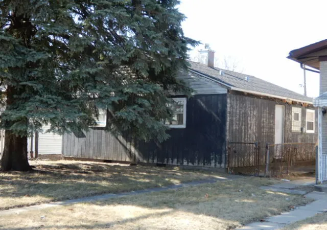 Photo 1 of Single Family Residence at 14034 S Saginaw Ave, Chicago, IL 60633 | MLS# 12310137 | | Sold on 2025-07-21