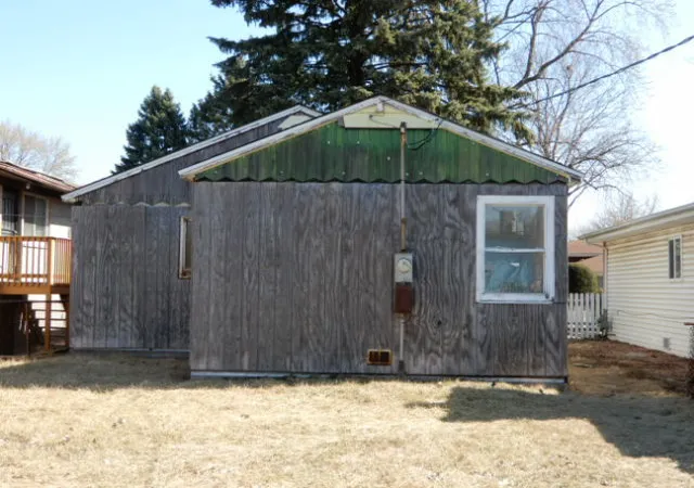 Photo 3 of Single Family Residence at 14034 S Saginaw Ave, Chicago, IL 60633 | MLS# 12310137 | | Sold on 2025-07-21