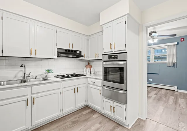 Photo 4 of Condominium at 34 King Arthur Ct #2, Northlake, IL 60164 | MLS# 12349628 | | Sold on 2025-06-24
