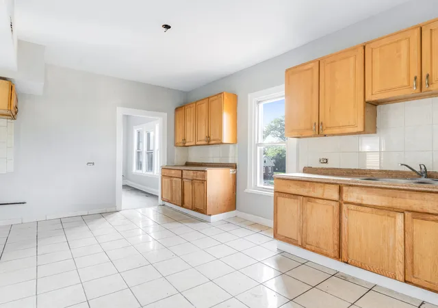 Photo 3 of Multi family home for sale at 9338 S Marquette Ave, Chicago, IL 60617 | MLS# 12510303 | Listing updated on 2026-10-09