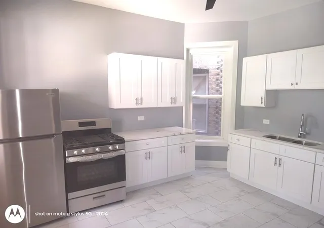 Photo 3 of Multi family home for sale at 1661 S Homan Ave, Chicago, IL 60623 | MLS# 12510986 | Listing updated on 2026-08-21