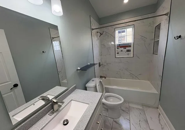 Photo 3 of Single family home for sale at 7011 S Aberdeen St, Chicago, IL 60621 | MLS# 12516381 | Listing updated on 2026-08-03