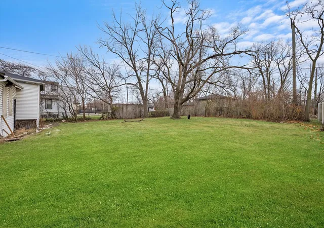 Photo 3 of Single family home for sale at 1905 W 142nd Street, Dixmoor, IL 60426 | MLS# 12528296 | Listing updated on 2026-09-22