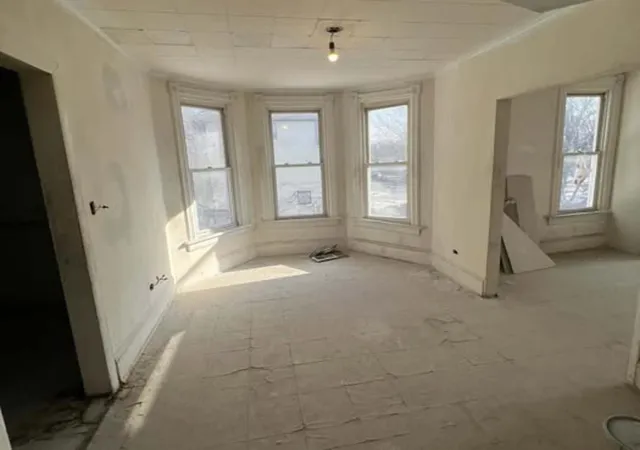 Photo 3 of Multi family home for sale at 1412 E 76th Street, Chicago, IL 60619 | MLS# 12532332 | Listing updated on 2026-10-01