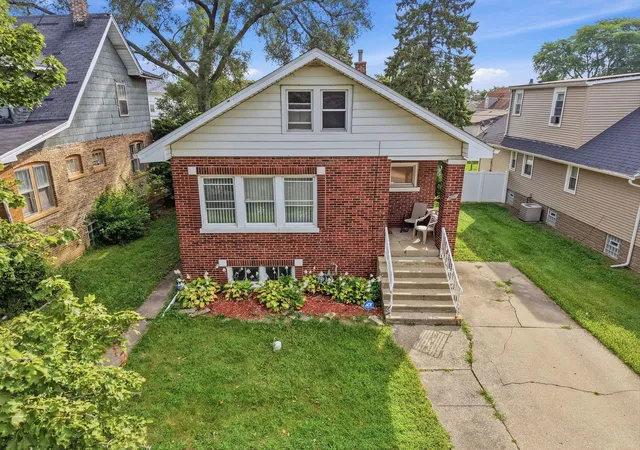 Single family home for sale at 617 23rd Avenue, Bellwood, IL 60104 | MLS# 12536929