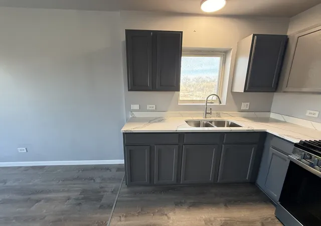 Photo 4 of Multi family home for sale at 1401 S Kedvale Ave, Chicago, IL 60623 | MLS# 12579856 | Listing updated on 2026-04-30