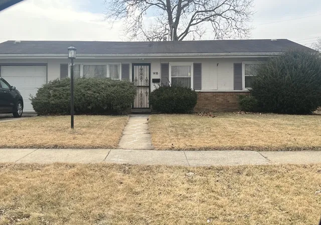 1st image of 1418 E 13th Pl, Ford Heights, IL 60411 | MLS# 12593424