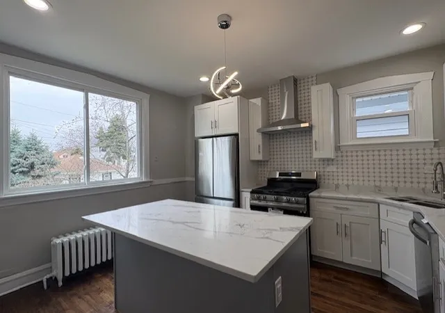 Photo 3 of Single family home for sale at 1336-1338 Grove Ave, Berwyn, IL 60402 | MLS# 12609286 | Listing updated on 2026-10-01