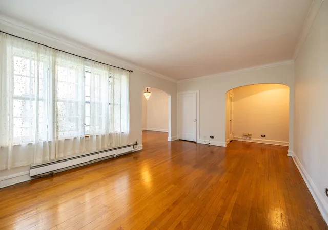 Homes for sale in Chicago, IL | 2430 W Greenleaf Ave #1, Chicago, IL 60645 | MLS# 12610899