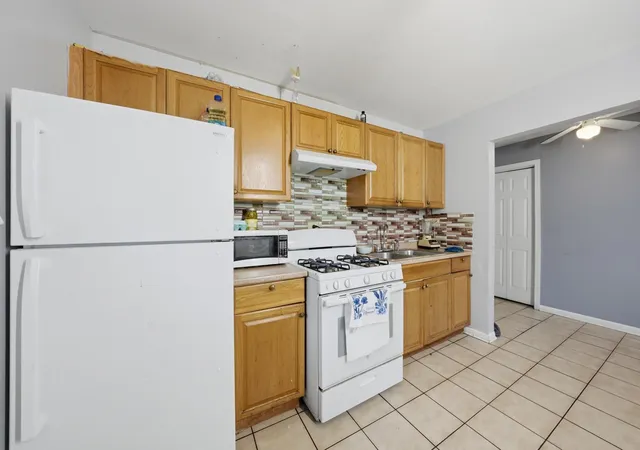 Photo 3 of Single family home for sale at 14703 Ellis Ave, Dolton, IL 60419 | MLS# 12616801 | Listing updated on 2026-09-22