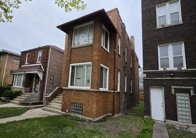Photo 2 of Multi family home for sale at 8215 S Eberhart Ave, Chicago, IL 60619 | MLS# 12620968 | Listing updated on 2026-09-15