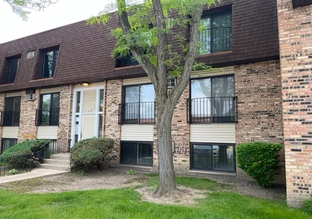 Listing Photo 1 - Condo for sale in building located at 183 N Waters Edge Dr W, Glendale Heights, IL 60139 - Unit #301