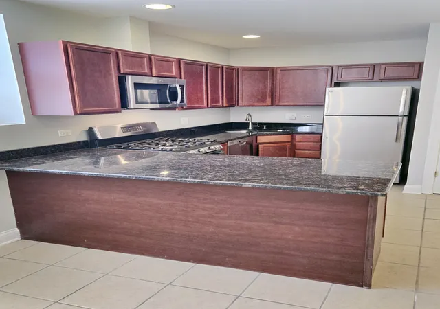 Photo 2 of Townhouse for sale at 1937 W Granville Ave, Chicago, IL 60660 | MLS# 12636269 | Listing updated on 2026-08-11