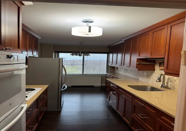 Photo 2 of Condo for sale at 6933 N Kedzie Ave #615, Chicago, IL 60645 | MLS# 12657098 | Listing updated on 2026-09-20
